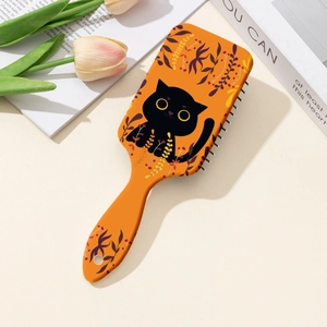Orange cartoon cat hairbrush with floral patterns and soft air cushion bristles