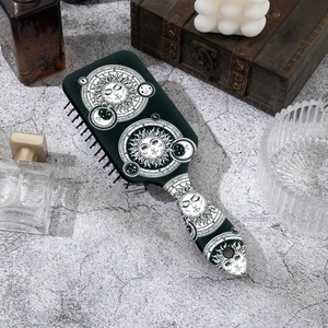 Brosse à cheveux à coussin d'air imprimé soleil et lune sur fond rétro et esthétique
