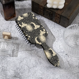 Brosse à cheveux pneumatique avec motif constellation soleil et lune pour massage cuir