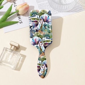 Floral print paddle hair brush with ergonomic handle and artistic watercolor pattern