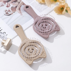 Hollow spiral massage hairbrush set with cat ear design in soft pink and khaki colors