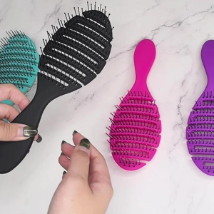 Lot de 4 brosses à cheveux ventilées noires, turquoise, rose et violettes pour massage