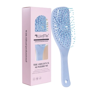 Blue vented hair brush with honeycomb design and pink packaging box for hair styling