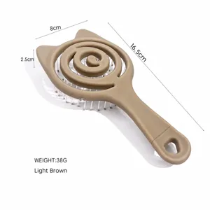 Detailed view of cat-ear hollow hairbrush in light brown with specific dimensions