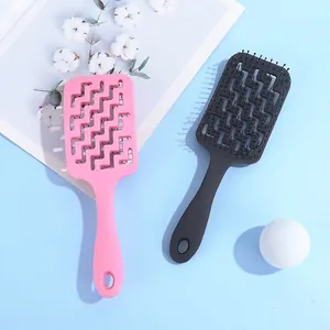 Eco-friendly vented hairbrush set in pink and black with ergonomic massage bristles