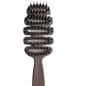 Brown vented hairbrush with boar bristles and massage beads on a white background
