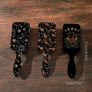Set of three air cushion hairbrushes with moon, deer and moth prints, 8.46x2.75 inches