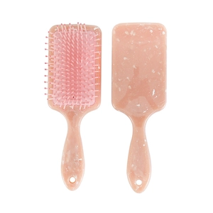 Pink marble pattern paddle hairbrush with air cushion and massage bristles for detangling