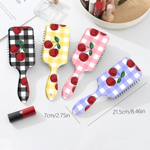 Set of four checkered paddle hair brushes with cherry print and ergonomic handles