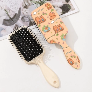 Cute Capybara air cushion massage hairbrush in cream white with cartoon graphics