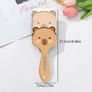 Detail view of the Capybara patterned hairbrush showing exact dimensions and cute design