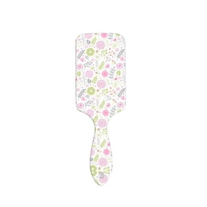 Spazzola per capelli con cuscino d'aria floreale con fiori rosa e foglie verdi su bianco