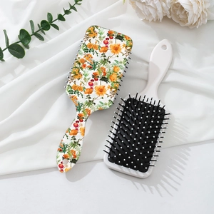 Floral print air cushion hairbrush set with ergonomic handle and hanging hole design