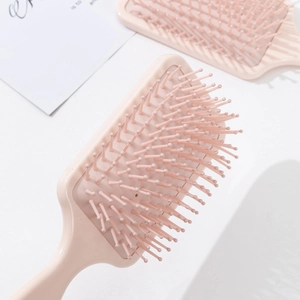 3D floral pink air cushion hairbrush with scalp massage bristles for smooth hair styling