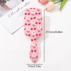 Pink cherry print air cushion hairbrush for detangling, size 21.5cm by 7cm