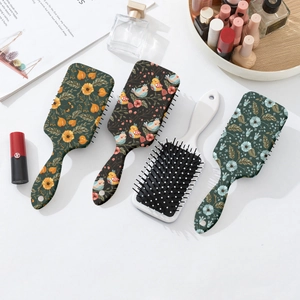 Set of four floral bohemian air cushion hairbrushes featuring sunflower and bird prints