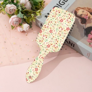 Floral paddle brush for scalp massage with cute pattern and ergonomic handle design