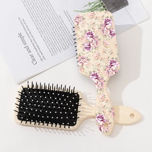 Eco-friendly floral print massage hair brush set with pink and purple flower pattern
