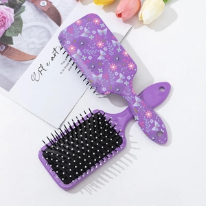 Pastel purple floral hair brush with anti-tangle bristles and elegant butterfly prints