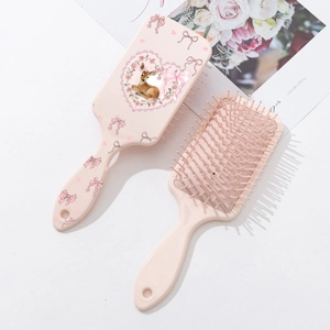 Pink paddle hairbrush set with cute deer print and bow design for scalp massage