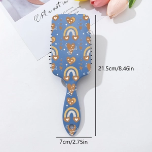 Detail of blue Bohemian hairbrush with rainbow and heart patterns and size dimensions