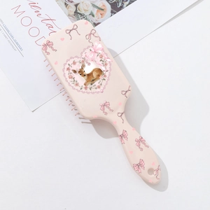 Pink hair paddle brush with cute deer and rose floral print for scalp massage