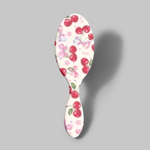 Hair brush with cherry bow print and air cushion for scalp massage and hair volume