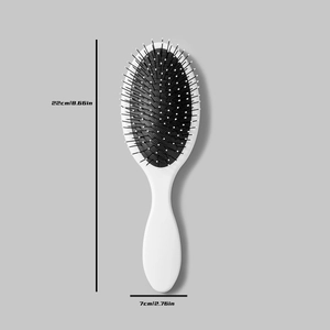 Detail view showing dimensions of the oval massage hairbrush with skull print