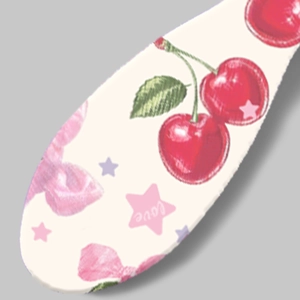 Padded hairbrush with cherry and pink bow print design for voluminous hair styling