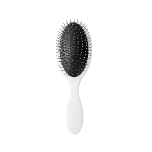 Pink floral hair cushion brush with ergonomic white handle and black massaging bristles