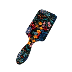 Vintage floral print paddle brush with vibrant yellow flowers and air cushion bristles