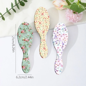 Brosses à cheveux à coussin d'air ovales à fleurs en trois couleurs avec dimensions