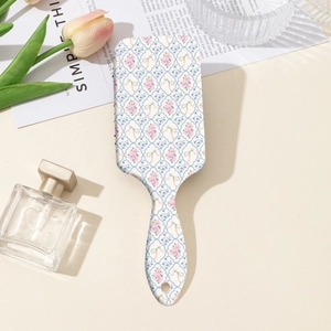 Spazzola per capelli con stampa floreale, impugnatura ergonomica e design vintage chic