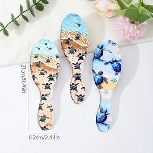 Three sea turtle ocean pattern hair brushes with 21cm x 6.2cm size dimensions