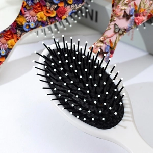 Spazzola per capelli ovale con stampe 3D floreali, massaggio a cuscino d'aria e setole