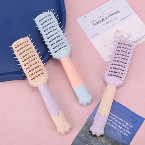 Pastel cat claw hairbrush set with hollow massage bristles and ergonomic smile handle