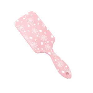 Pink hair brush with cute spider web print and heart design for women's hair care