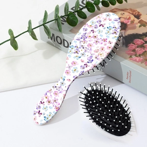 Brosse à cheveux pneumatique à fleurs avec picots massants et accessoires de style