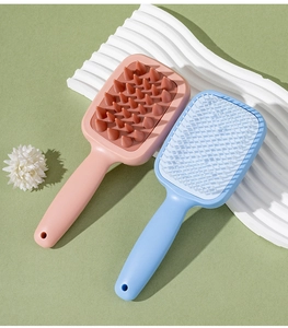 Close-up of silicone massage bristles and fine comb teeth for scalp cleansing and hair care