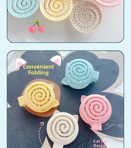 Detail view of macaron colored cat ear folding hair combs in various pastel shades