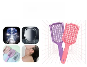 Close-up of curved vented hairbrush with massage bristles and colorful matte finish