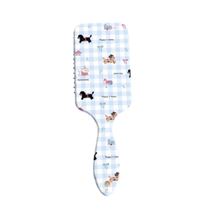 Air cushion hairbrush featuring cute puppy illustrations and bow prints on blue plaid