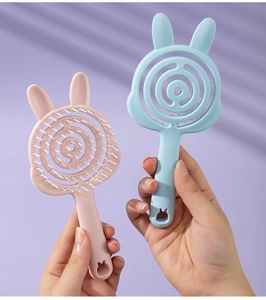 Pink and blue cute rabbit-shaped hair combs with flexible hollow massage bristles