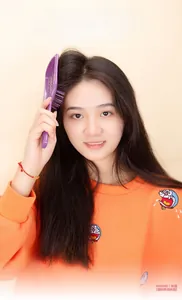 Detail of purple diamond hollow hairbrush for scalp massage and volumizing hair styling