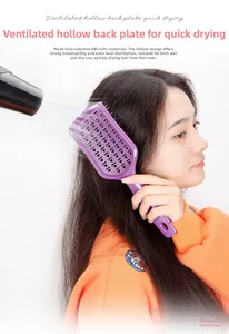 Purple vented hairbrush shown with a hair dryer to demonstrate fast drying feature