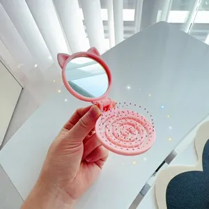 Pink kitten folding mirror hair comb for portable styling and touch-ups on the go