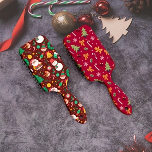 Christmas hairbrush set with gingerbread man and Santa patterns on festive red background