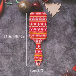 Bohemian Christmas reindeer hair brush with festive knit pattern on stone background