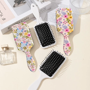 Set di spazzole per capelli floreali con pettini antistatici a cuscino d'aria in bianco