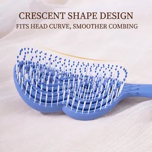 Brosse à cheveux de massage bleu ciel avec design creux courbé et poils blancs